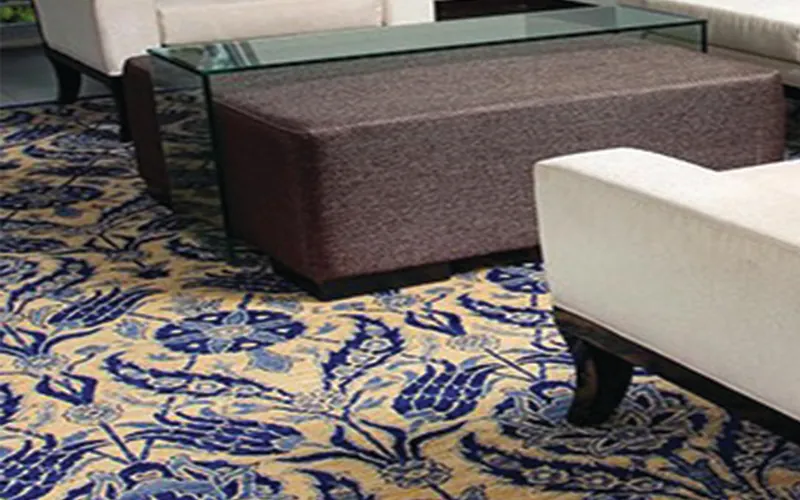 Blue and gold oriental rug in a modern living room