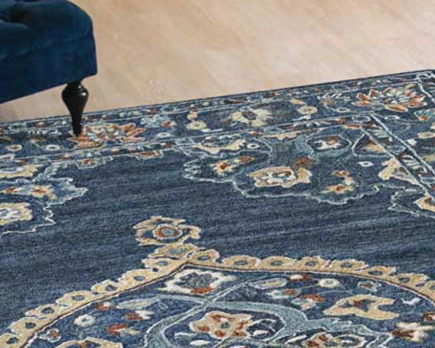 Freshly cleaned blue medallion oriental rug in a living room