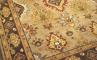 Close-up of a repaired oriental rug border